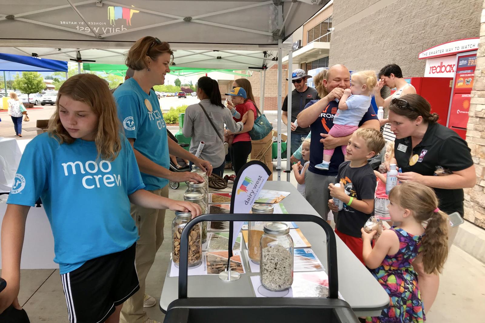 People learn about dairy nutrition and are encouraged to donate “Moo Bucks” during a kick-off event at a Meridian Albertsons grocery store June 1. The campaign aims to raise money to provide needy families with milk and other dairy products. 