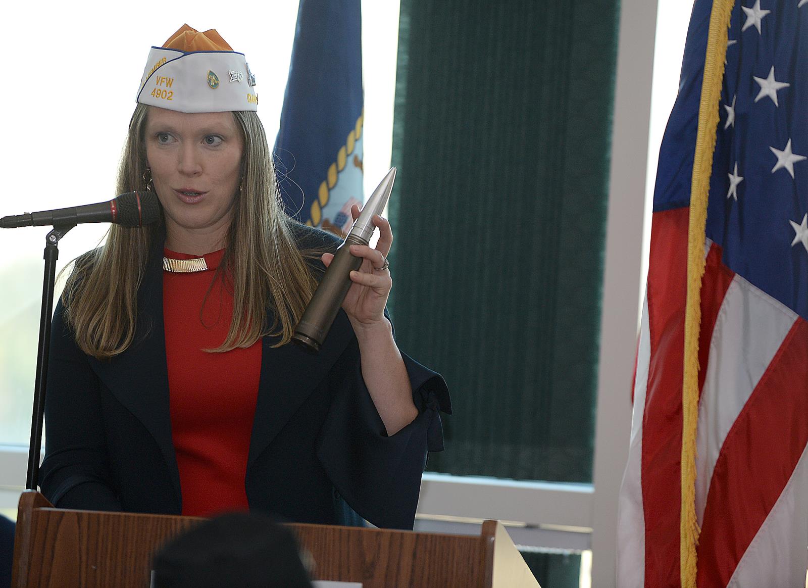 Rep. Priscilla Giddings, shows an A-10 “Warthog” bullet at the 9th Annual Farm Bureau Salute to Idaho Veterans.