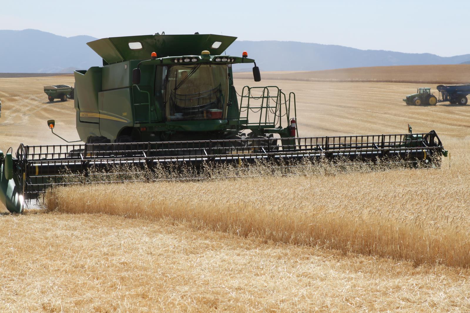A barley field near Soda Springs is harvested in September. A recent Gallup poll showed that Americans feel more positive about farming and agriculture than any other industry. 