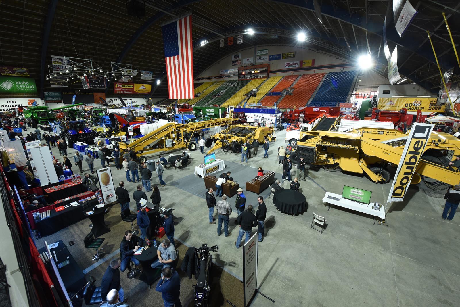 People check out farm equipment during the 2020 Eastern Idaho Ag Expo in Holt Arena in Pocatello. The Eastern Idaho Ag Expo and other farm equipment shows were held virtually this year and that might be impacting sales of farm equipment.