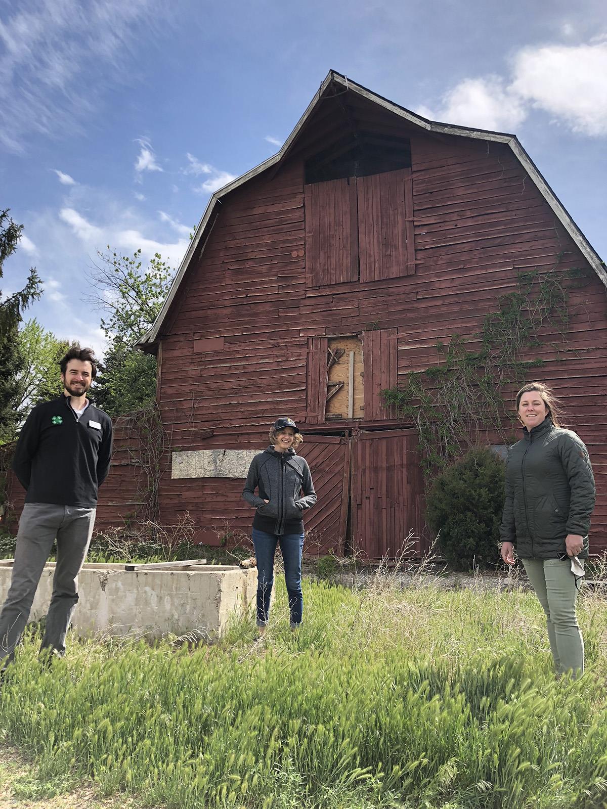 People involved in Boise’s Spaulding Ranch farm project stand in front of an old barn at the site of a historical but inactive farmstead. The city of Boise plans to revive Spaulding Ranch as a city park that is also a farm. From left to right: Allen Taggert (Ada County 4-H), Ariel Agenbroad (University of Idaho Extension) and Sara Arkle (city of Boise). 
